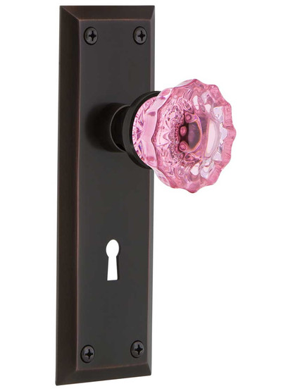 New York Mortise Lock Set with Colored Fluted Crystal Glass Knobs Pink in Timeless Bronze.